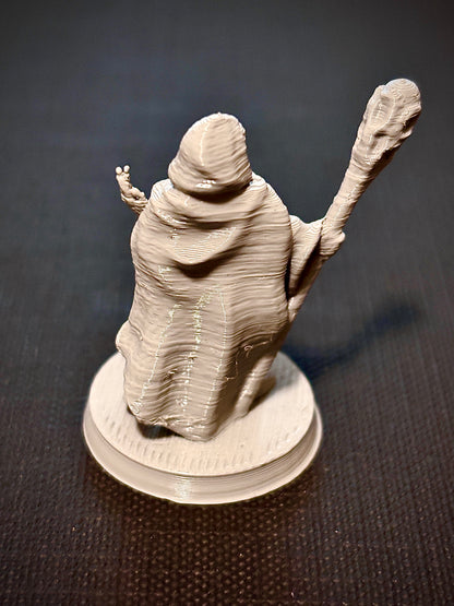 Humana Maga com Cajado - Vista traseira